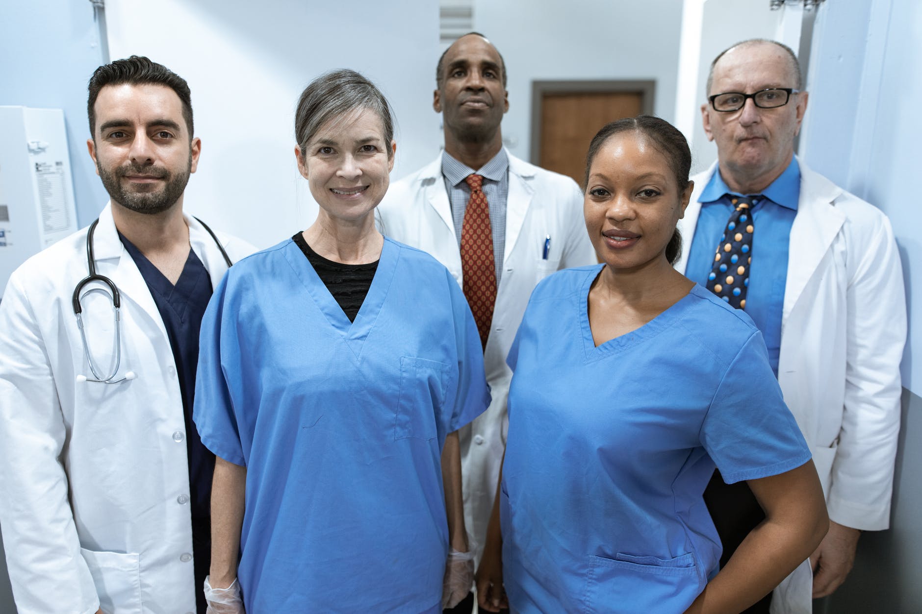 health care professionals smiling at the camera